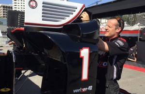 Will Power's mechanic works on a spare rear wing for the Team Penske driver. [Eddie LePine Photo]