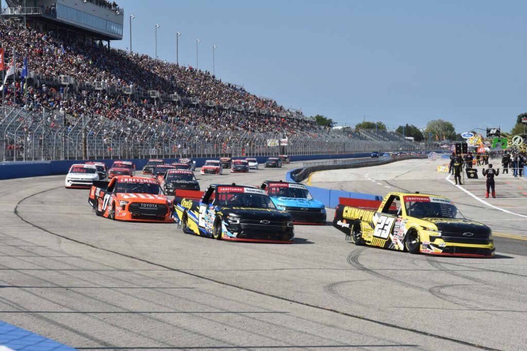 The Craftsman Truck Series returns to the Milwaukee Mile on a pace lap past the crowd in the stands. [John Wiedemann Photo]